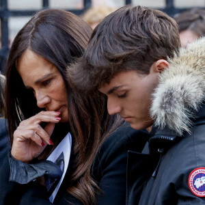 Nathalie Marquay et son fils Tom - La famille de Jean-Pierre Pernaut à la sortie des obsèques en la Basilique Sainte-Clotilde à Paris le 9 mars 2022. © Cyril Moreau/Bestimage