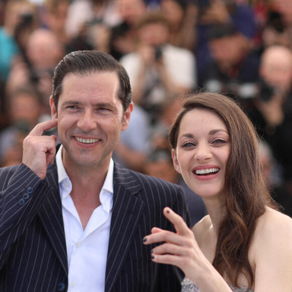Marion Cotillard, Melvil Poupaud au photocall de "Brother And Sister (frère et soeur)" lors du 75ème Festival International du Film de Cannes, le 21 mai 2022. © Dominique Jacovides/Bestimage 