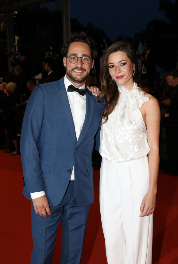 Thomas Hollande et sa femme Emilie Broussouloux - Montée des marches du film "R.M.N." lors du 75ème Festival International du Film de Cannes, le 21 mai 2022. © Dominique Jacovides / Bestimage 