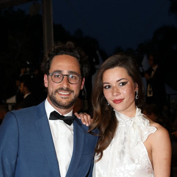 Thomas Hollande et sa femme Emilie Broussouloux - Montée des marches du film "R.M.N." lors du 75ème Festival International du Film de Cannes, le 21 mai 2022. © Dominique Jacovides / Bestimage 