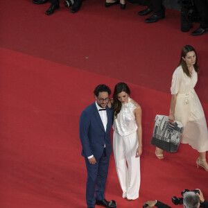 Thomas Hollande, sa femme Emilie Broussouloux - Montée des marches du film "R.M.N." lors du 75ème Festival International du Film de Cannes, le 21 mai 2022. © Pool/ Bestimage 