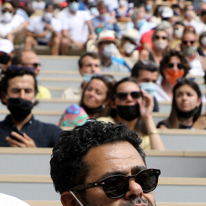 Jamel Debbouze et Marc Ladreit de Lacharrière dans les tribunes des internationaux de France Roland Garros à Paris le 12 juin 2021. © Dominique Jacovides / Bestimage