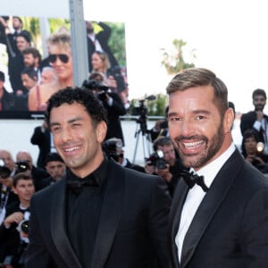 Jwan Yosef et son mari Ricky Martin - Montée des marches du film « Elvis » lors du 75ème Festival International du Film de Cannes. Le 25 mai 2022 © Cyril Moreau / Bestimage  Red carpet of the movie « Elvis » during the 75th Cannes International Film Festival. On may 25th 2022 