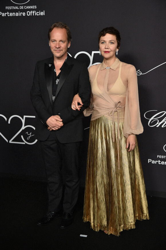 Peter Sarsgaard et Maggie Gyllenhaal - Photocall de la soirée "Chopard Loves Cinema" à l'hôtel Martinez lors du 75ème Festival International du Film de Cannes. Le 25 mai 2022 © Olivier Borde / Bestimage