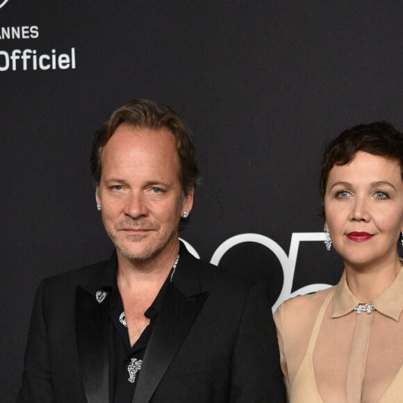 Peter Sarsgaard et Maggie Gyllenhaal - Photocall de la soirée "Chopard Loves Cinema" à l'hôtel Martinez lors du 75ème Festival International du Film de Cannes. Le 25 mai 2022 © Olivier Borde / Bestimage
