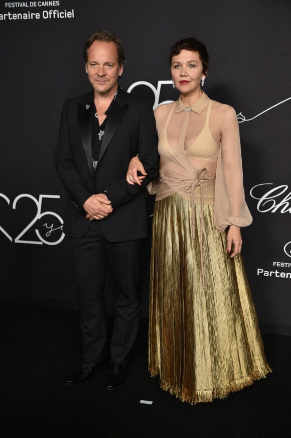 Peter Sarsgaard et Maggie Gyllenhaal - Photocall de la soirée "Chopard Loves Cinema" à l'hôtel Martinez lors du 75ème Festival International du Film de Cannes. Le 25 mai 2022 © Olivier Borde / Bestimage