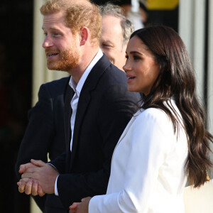 Le prince Harry, duc de Sussex, et Meghan Markle, duchesse de Sussex assistent à un engagement à la veille des Jeux Invictus 2020 aux Pays-Bas, à La Haye, le 15 avril 2022