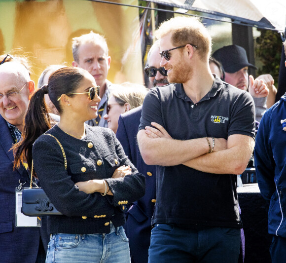 Le prince Harry et Meghan Markle lors du "Land Rover Challenge" au premier jour des Invictus Games 2020 à La Haye, le 16 avril 2022.