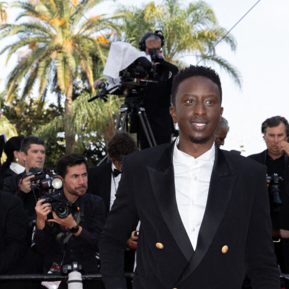 Ahmed Sylla - Montée des marches du film " Un petit frère " lors du 75ème Festival International du Film de Cannes. Le 27 mai 2022 © Olivier Borde / Bestimage 