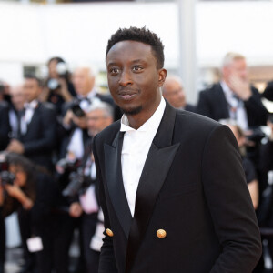 Ahmed Sylla - Montée des marches du film " Un petit frère " lors du 75ème Festival International du Film de Cannes. Le 27 mai 2022 © Cyril Moreau / Bestimage 