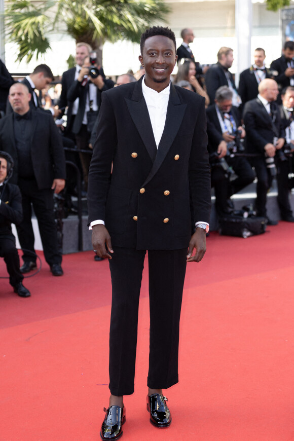 Ahmed Sylla - Montée des marches du film " Un petit frère " lors du 75ème Festival International du Film de Cannes. Le 27 mai 2022 © Cyril Moreau / Bestimage 