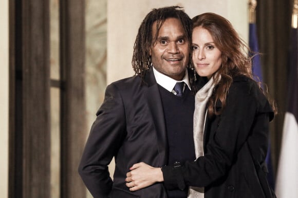 L'ancien footballeur français Christian Karembeu et sa femme Jacky Chamoun - Dîner au Palais de l'Elysée en l'honneur des 50 ans du Variétés Club de France, à Paris. © Stéphane Lemouton / Bestimage