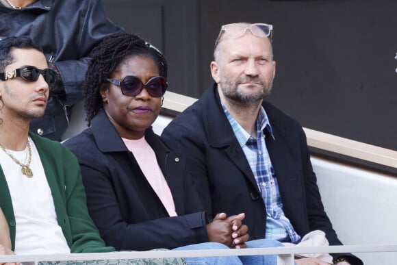 Claudia Tagbo et son compagnon - People dans les tribunes lors des Internationaux de France de Tennis de Roland Garros 2022 à Paris le 29 mai 2022. © Cyril Moreau/Bestimage