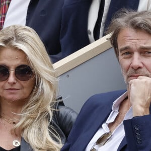 Patrick Puydebat et sa femme Magali - People dans les tribunes lors des Internationaux de France de Tennis de Roland Garros 2022 à Paris le 29 mai 2022. © Cyril Moreau/Bestimage