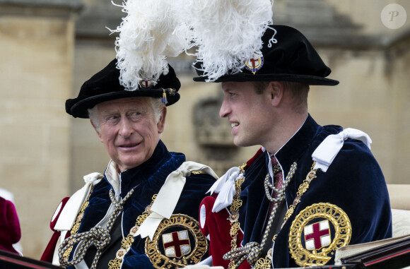 Le prince Charles, prince de Galles, le prince William, duc de Cambridge, lors de la cérémonie de l'ordre de la Jarretière à la chapelle Saint-Georges du château de Windsor. Cette année pour la première fois Camilla Parker Bowles, duchesse de Cornouailles, a été investie comme nouveau chevalier de l'ordre de la Jarretière par la reine et a pu participer à la procession au côté du prince Charles. Londres, la 13 juin 2022. 