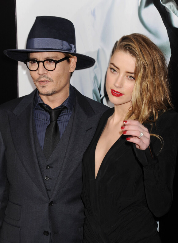 Johnny Depp et sa fiancée Amber Heard le 12 février 2014.