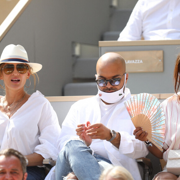 Saïd Boussif, Vitaa et Amel Bent dans les tribunes des internationaux de France Roland Garros à Paris le 12 juin 2021. © Dominique Jacovides / Bestimage 