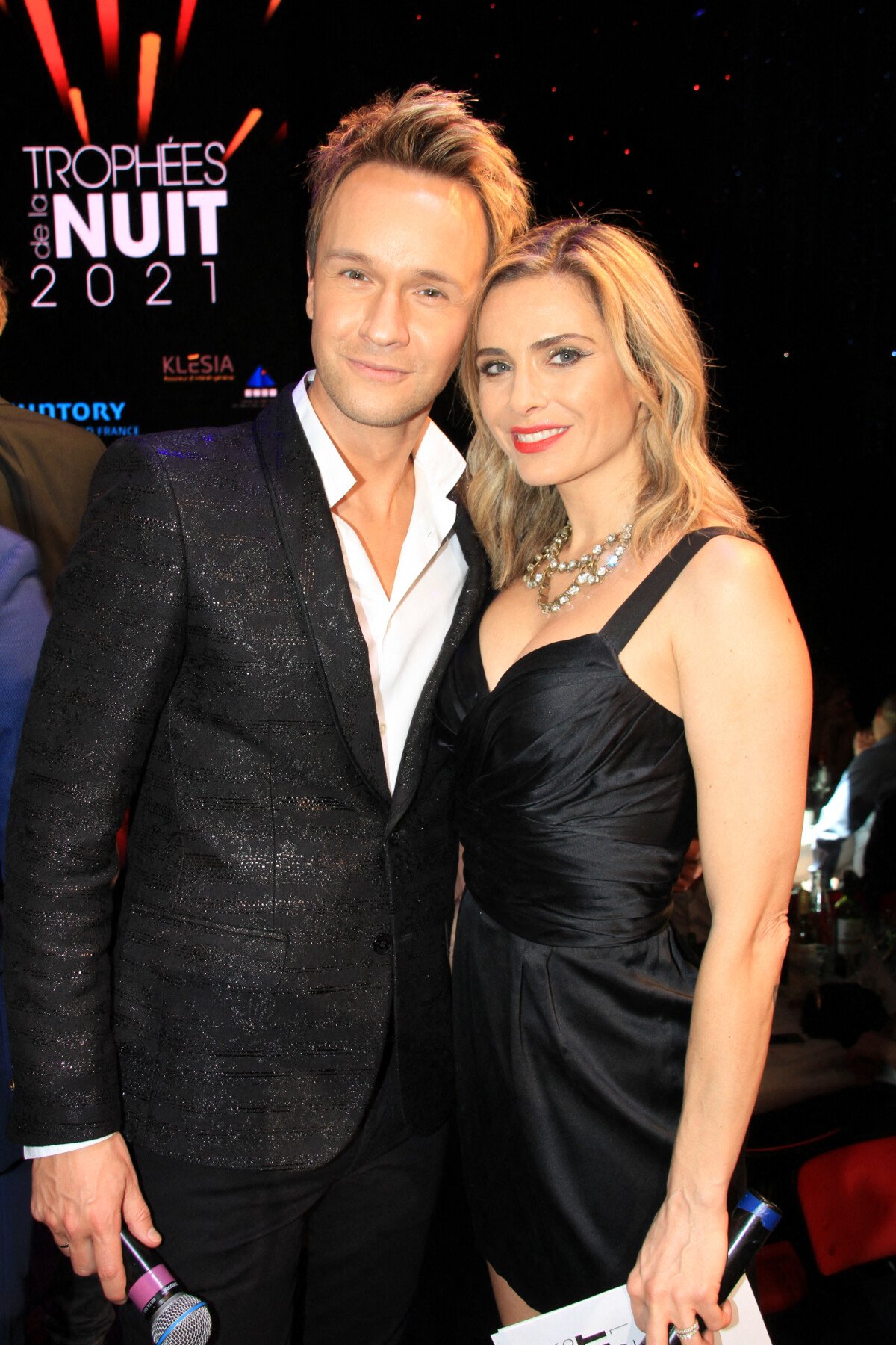 Photo : Cyril Féraud, Clara Morgane lors de la soirée de la 27ème édition  des Trophées de la Nuit au Lido le 21 mars 2022. © Philippe Baldini /  Bestimage - Purepeople