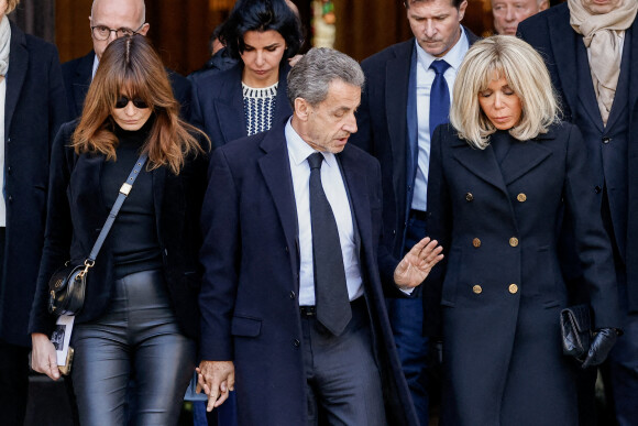 Carla Bruni, Nicolas Sarkozy, Brigitte Macron - Sorties des obsèques de Jean-Pierre Pernaut en la Basilique Sainte-Clotilde à Paris le 9 mars 2022. © Cyril Moreau/Bestimage 