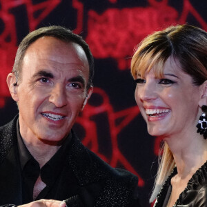 Nikos Aliagas et sa compagne Tina Grigoriou lors de la 23ème édition des NRJ Music Awards 2021 au Palais des Festivals de Cannes, le 20 novembre 2021. 