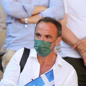 Nikos Aliagas dans les tribunes des Internationaux de France de Roland Garros à Paris le 11 juin 2021. © Dominique Jacovides / Bestimage 