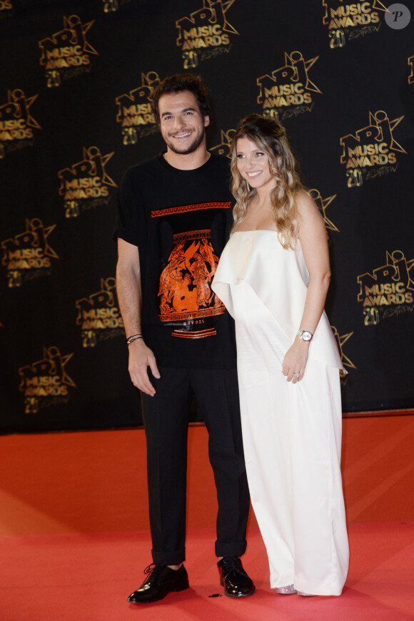 Amir Haddad et sa femme Lital (enceinte) - 20ème cérémonie des NRJ Music Awards au Palais des Festivals à Cannes. Le 10 novembre 2018 © Christophe Aubert via Bestimage 