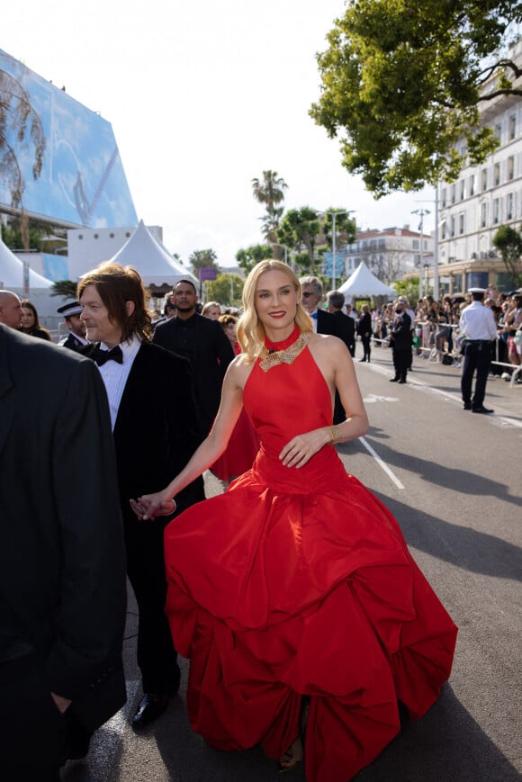 Diane Kruger et son compagnon Norman Reedus avant la montée des marches de "L'innocent" lors du 75ème Festival International du Film de Cannes, le 24 mai 2022. Justin Personnaz/Bestimage 