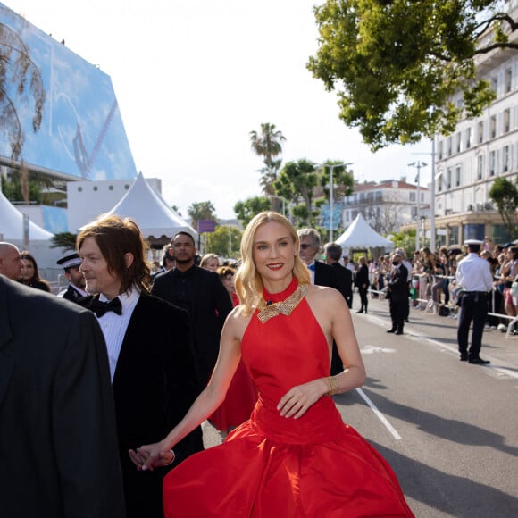 Diane Kruger et son compagnon Norman Reedus avant la montée des marches de "L'innocent" lors du 75ème Festival International du Film de Cannes, le 24 mai 2022. Justin Personnaz/Bestimage 