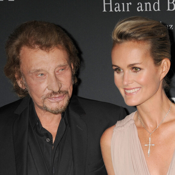 Johnny Hallyday et sa femme Laeticia Hallyday - People a la soiree "The Pink Party 2013" au Barker Hangar a Santa Monica, le 19 Octobre 2013 au benefice du Programme de lutte contre les cancers feminins de l'Institut "Samuel Oschin Comprehensive Cancer" de l'hopital Cedars-Sinai.