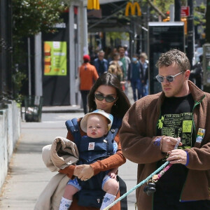 Exclusif - Emily Ratajkowski et son mari Sebastian Bear-McClard se promènent avec leur bébé et leur chien dans les rues de New York le 1er mai 2022.