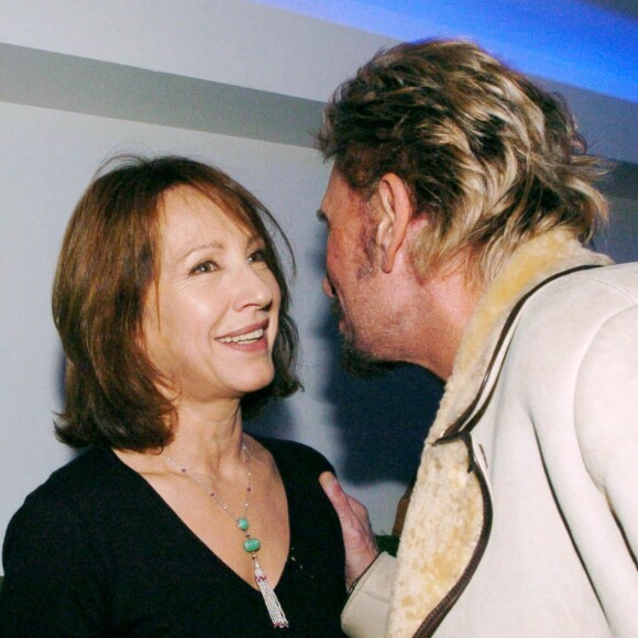 Nathalie Baye et Johnny Hallyday en 2004. 