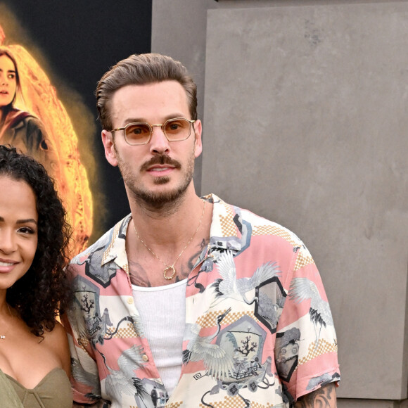 Christina Milian et M Pokora (Matt Pokora) à la première du film "Jurassic World Dominion" à Los Angeles. 