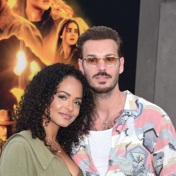 Christina Milian et son mari M Pokora (Matt Pokora) à la première du film "Jurassic World Dominion" à Los Angeles, le 6 juin 2022. 
