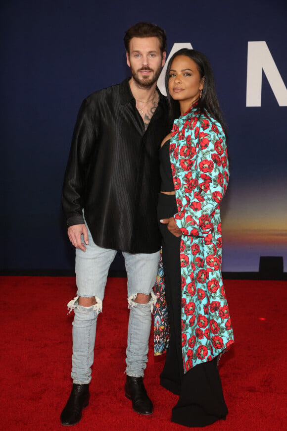 Matt Pokora et sa femme Christina Milian au photocall lors de la première du film "Ambulance" à Los Angeles. 