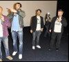 Éric Judor, Ramzy Bedia et Luc Besson à la première du film "Halal, police d'état" à Paris.