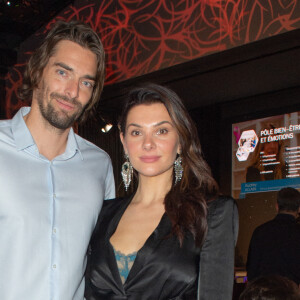 Camille Lacourt et sa compagne Alice Detollenaere lors de la soirée de gala de l'Institut Rafaël, maison de l'après Cancer, au Pavillon Gabriel à Paris le 13 décembre 2021. © Erez Lichtfeld / Bestimage