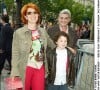 Véronique Genest, son mari Meyer Bokobza et leur fils Sam pour la première du fils "Spiderman 2" à Paris.