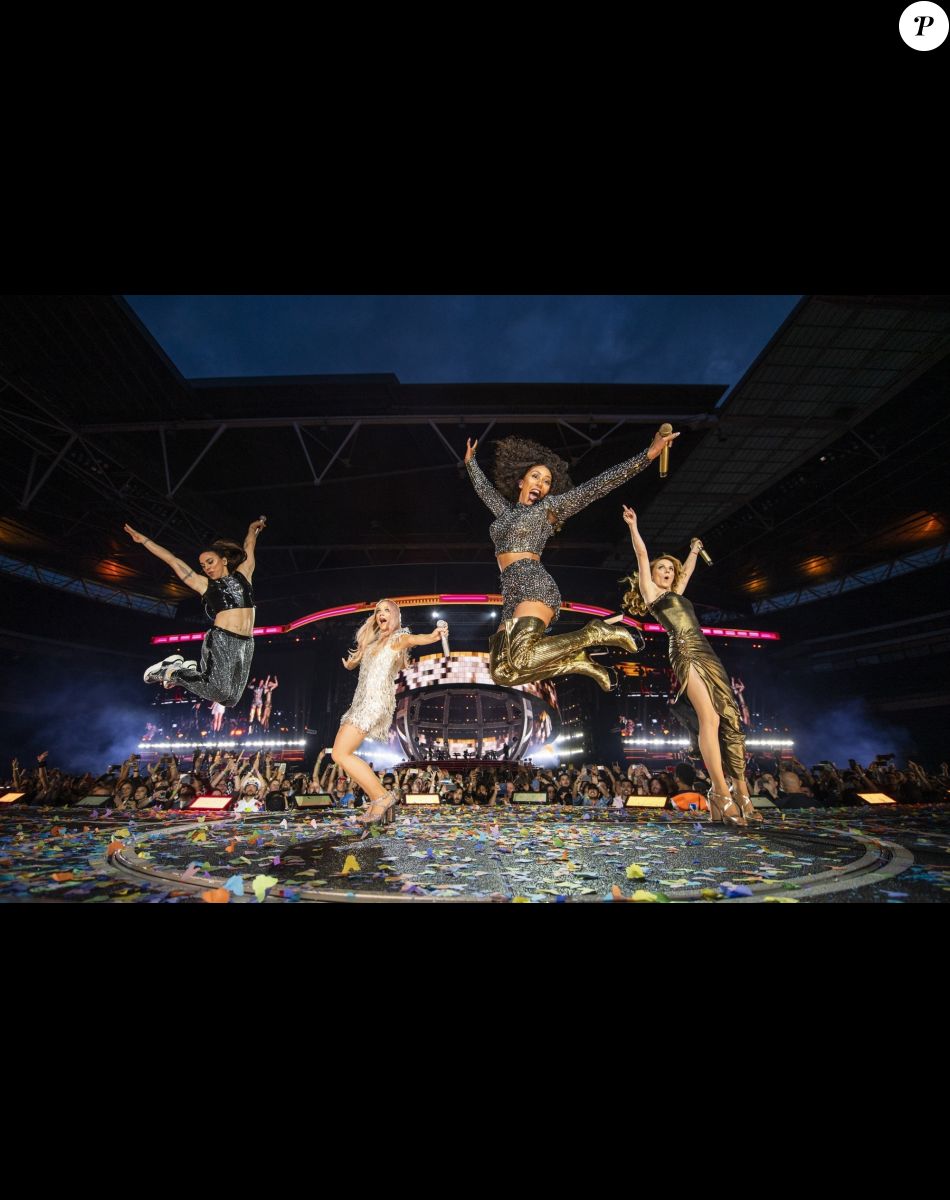 Geri Halliwell, Melanie Brown (Mel B), Melanie Chisholm (Mel C) et Emma Bunton - Les Spice Girls en concert au Stade de Wembley dans le cadre de leur tournée "Spice World UK Tour". Londres, le 20 juin 2019.