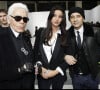 Jean-Luc Delarue et son épouse Anissa Khel, et Karl Lagerfeld – people au défilé Dior hommes à Paris en janvier 2012