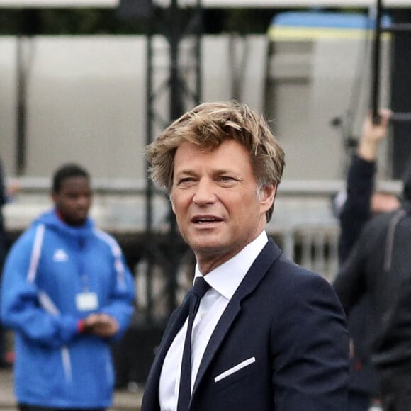 Le journaliste Laurent Delahousse lors du défilé militaire du Jour de la Bastille sur l'avenue des Champs Elysées, à Paris, le 14 juillet 2021.