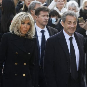 Brigitte Macron, Nicolas Sarkozy et sa femme Carla Bruni-Sarkozy - Obsèques de Jean-Pierre Pernaut en la Basilique Sainte-Clotilde à Paris le 9 mars 2022. © Denis Guignebourg/ Bestimage