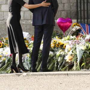 Le prince Harry, duc de Sussex, Meghan Markle, duchesse de Sussex devant le château de Windsor, suite au décès de la reine Elisabeth II d'Angleterre. Le 10 septembre 2022