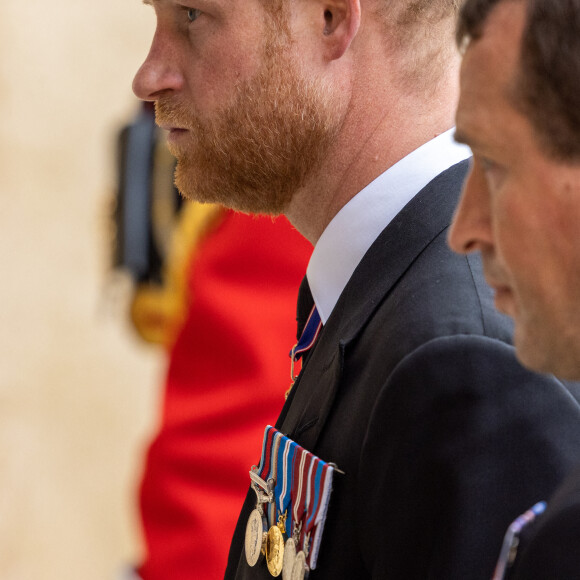 Le prince Harry, duc de Sussex - Procession pédestre des membres de la famille royale depuis la grande cour du château de Windsor (le Quadrangle) jusqu'à la Chapelle Saint-Georges, où se tiendra la cérémonie funèbre des funérailles d'Etat de reine Elizabeth II d'Angleterre. Windsor, le 19 septembre 2022.