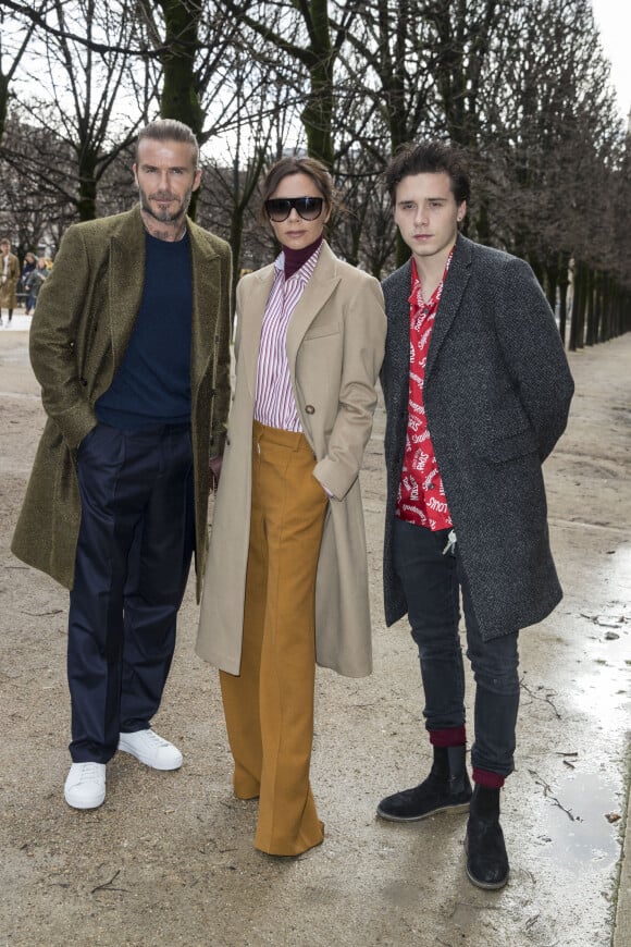 David Beckham, sa femme Victoria et leur fils Brooklyn - People au défilé de mode " Louis Vuitton " Hommes Automne-Hiver 2018 au Palais Royal à Paris. Le 18 janvier 2018 © Olivier Borde / Bestimage 