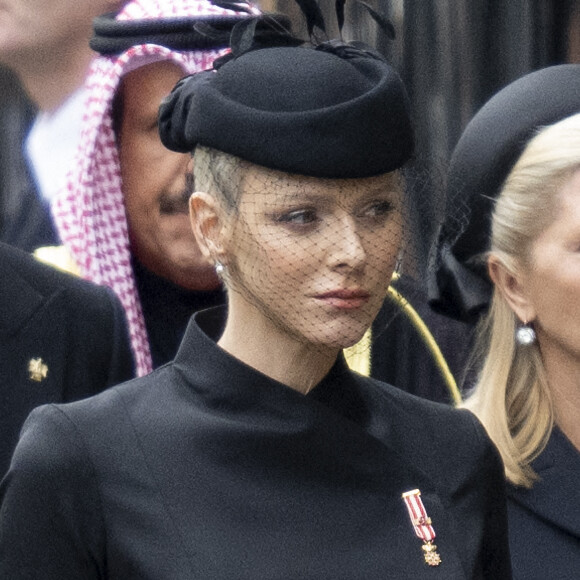 La princesse Charlene de Monaco - Arrivées au service funéraire à l'Abbaye de Westminster pour les funérailles d'Etat de la reine Elizabeth II d'Angleterre. Londres.