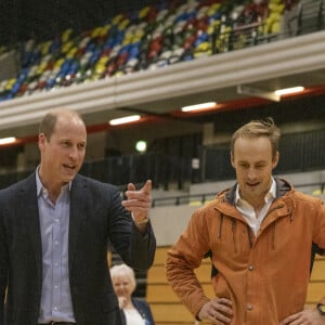 Le prince William, prince de Galles, visite la Copper Box Arena du Queen Elizabeth Olympic Park, pour participer à un événement avec Coach Core, qui fête ses 10 ans, à Londres, Royaume Uni, le 13 octobre 2022. 