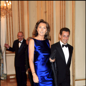 Nicolas Sarkozy et Cécilia Attias arrivent à la réception donnée à l'occasion de la visite du roi du Cambodge en France.