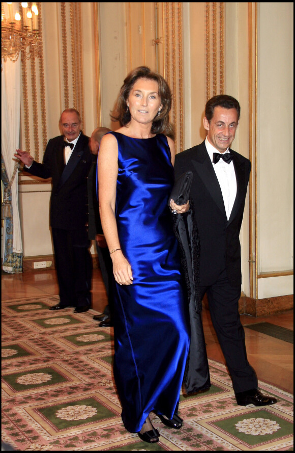 Nicolas Sarkozy et Cécilia Attias arrivent à la réception donnée à l'occasion de la visite du roi du Cambodge en France.