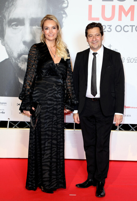 Laurent Gerra et sa femme Christelle Bardet font partie des couples invités à la cérémonie d'ouverture de la 14ème édition du Festival Lumière 2022 à la Halle Tony Garnier à Lyon