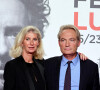 Gilles Cohen et sa femme Karine Paschal - Photocall lors de la cérémonie d'ouverture de la 14ème édition du Festival Lumière 2022 à la Halle Tony Garnier à Lyon le 15 octobre 2022. © Domnique Jacovides / Bestimage